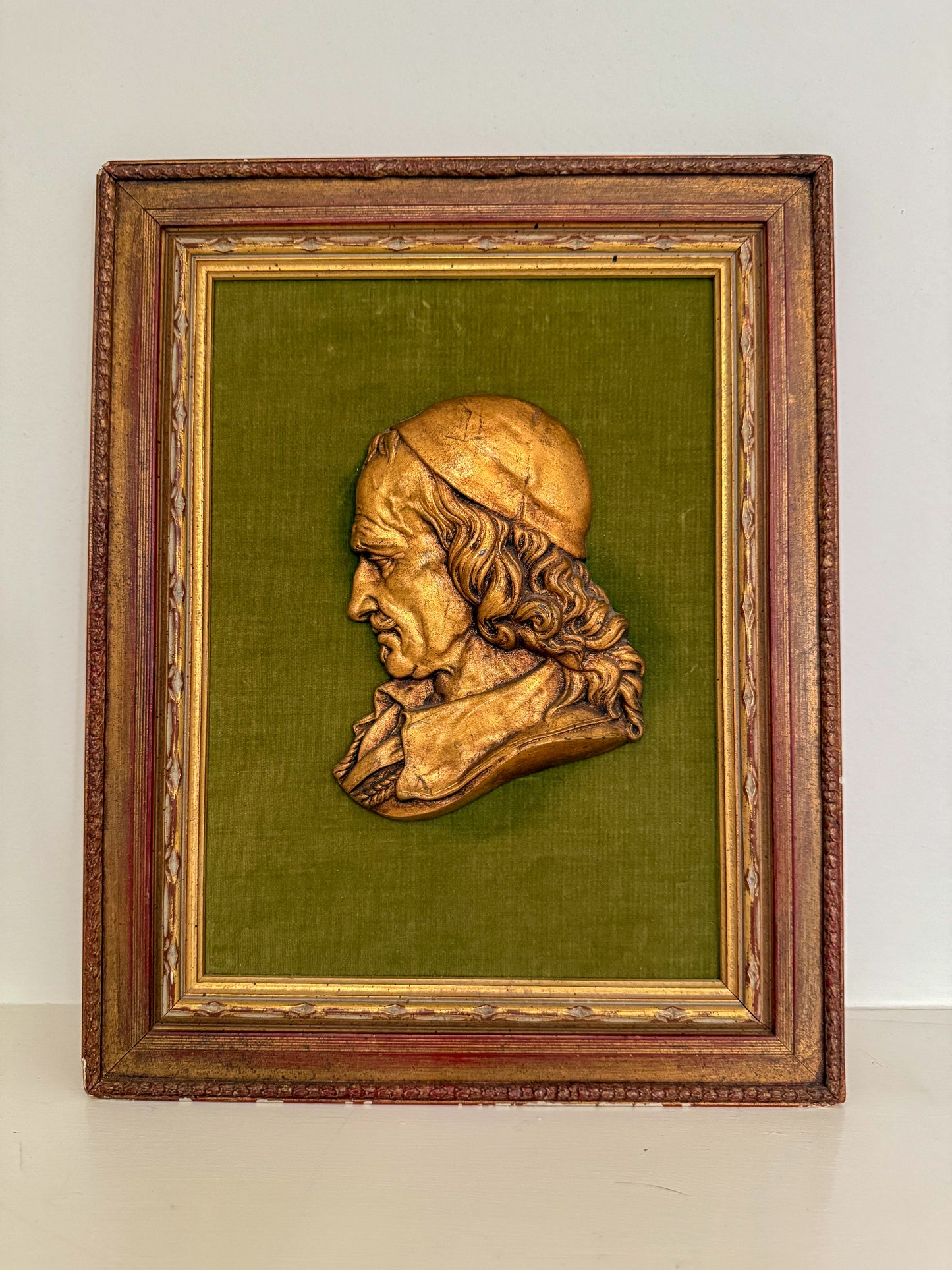 Framed Bronze Man on Green Velvet